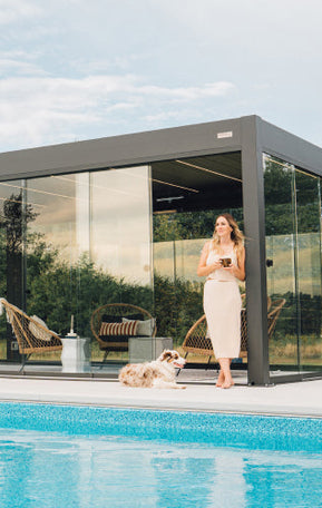 glass pergola by pool