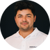 PERGOLUX customer service representative wearing a white shirt with 'PERGOLUX' logo on a black background