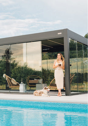 glass pergola by pool