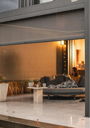 reading under cozy pergola