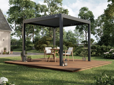 A modern, rectangular pergola made of aluminum, situated with lounge chairs and trees in the background.