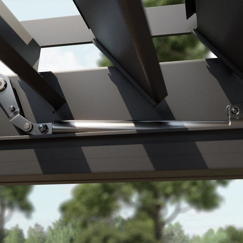 Close-up of a metal pergola motor with blurred greenery in the background