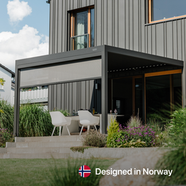 PERGOLUX modern outdoor pergola attached to a house, featuring the 'Designed in Norway' logo.