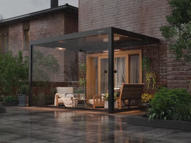 Waterproof pergola and rain going through the gutters away from the pergola